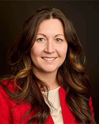 Professional photo of Carrie Geitner, District 2 Commissioner.