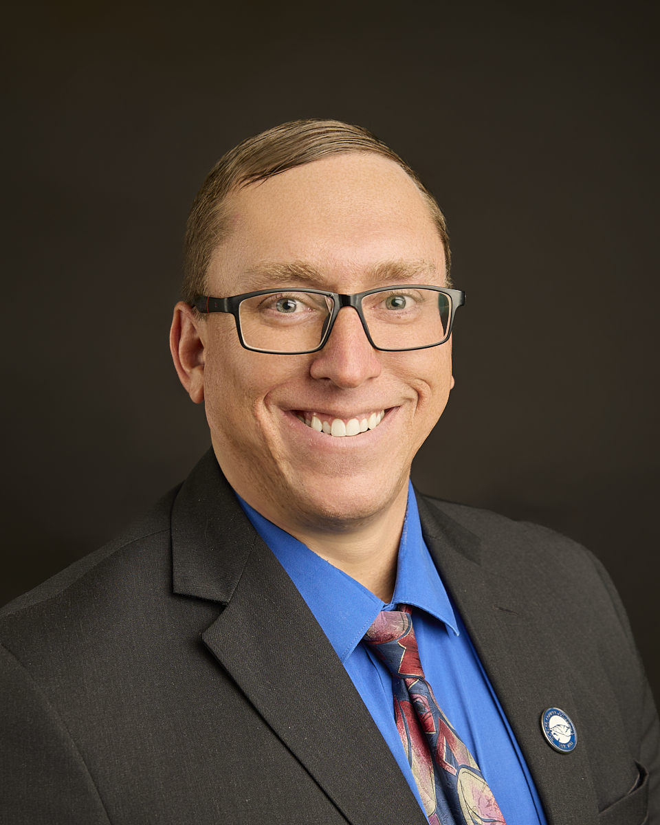 Professional Photo of Commissioner Cory Applegate for District 4