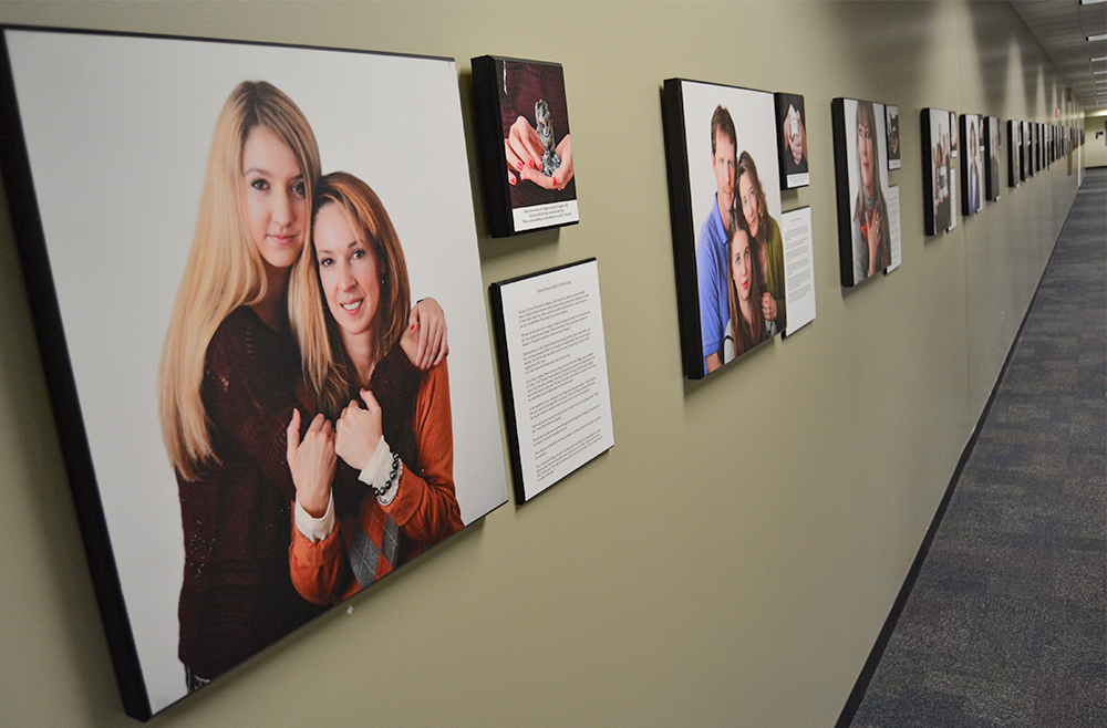 Faces of the Fire wall of photos