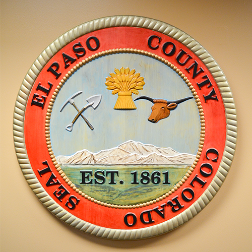Painted wooden county seal